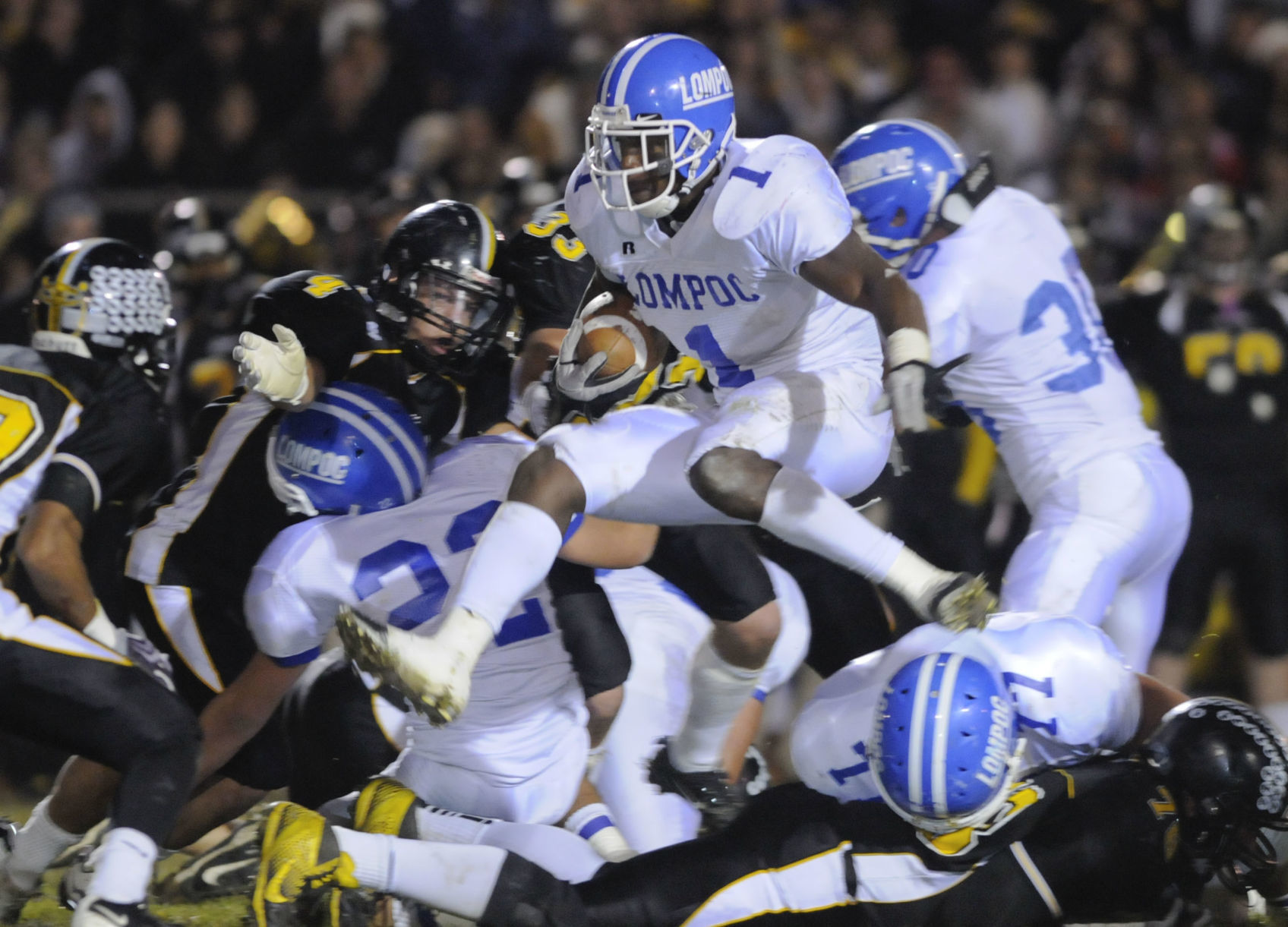 Player of the Decade: Toa Taua, Lavon Coleman, Caleb Thomas and Mike McCoy advance to regional semifinals